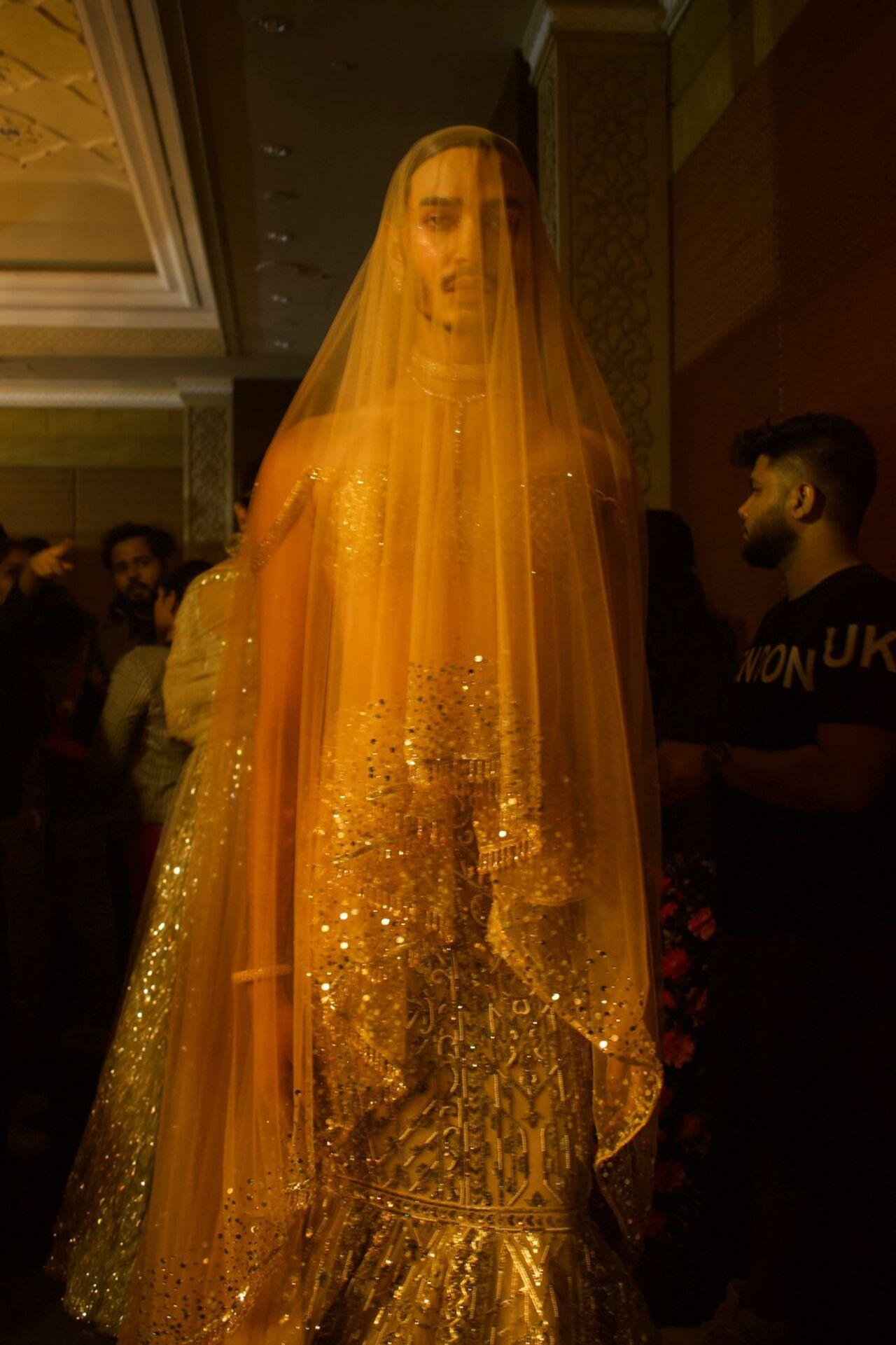 Gay model Rabanne Victor recently made headlines after he walked for Falguni Shane Peacock's opening show at India Couture Week 2023 in women's wear. He wore a glittering gold ensemble comprising a fishtail lehenga, a sheer veil and high heels